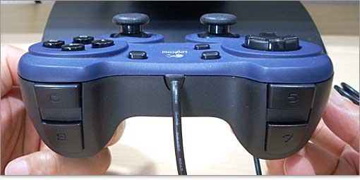 �g���K�[�{�^��